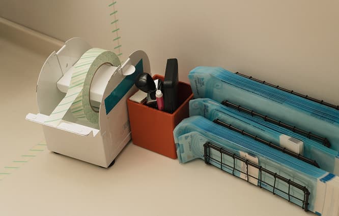 Office supplies neatly organized on a desk.